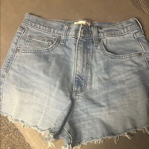 CO Light Wash High-Rise Denim Cutoff Shorts